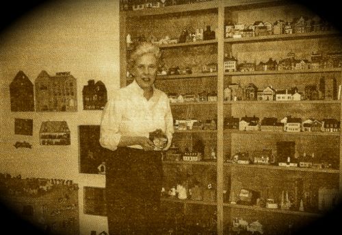 Photo of Pat Smith and miniature buildings 1996